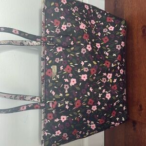 Kate Spade bag with floral pattern and black backbround🌸🌼